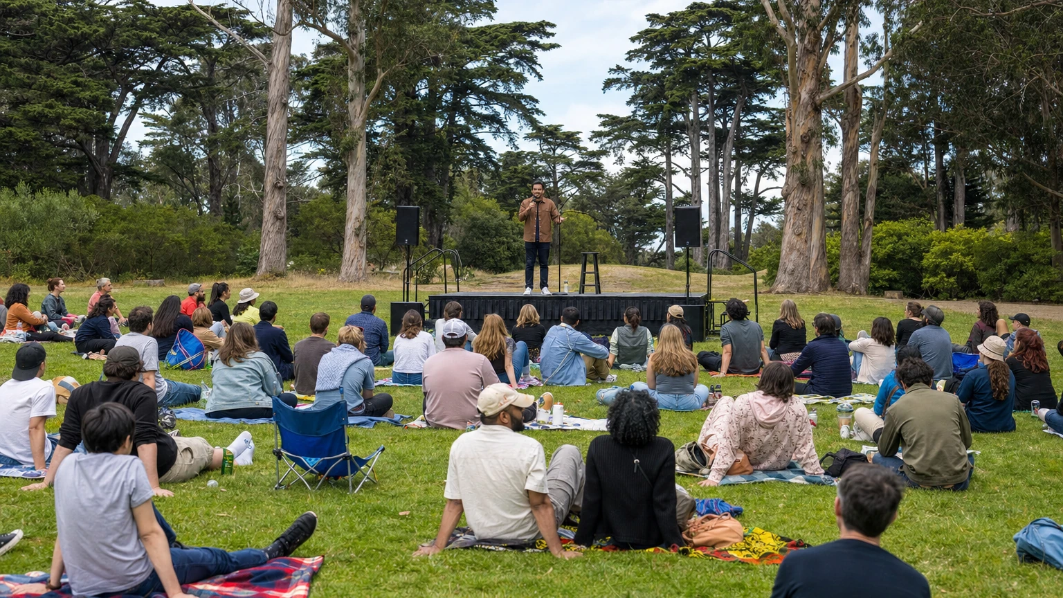 Representative illustration of an outdoor comedy festival crowd at Robin Williams Meadow in Golden Gate Park.